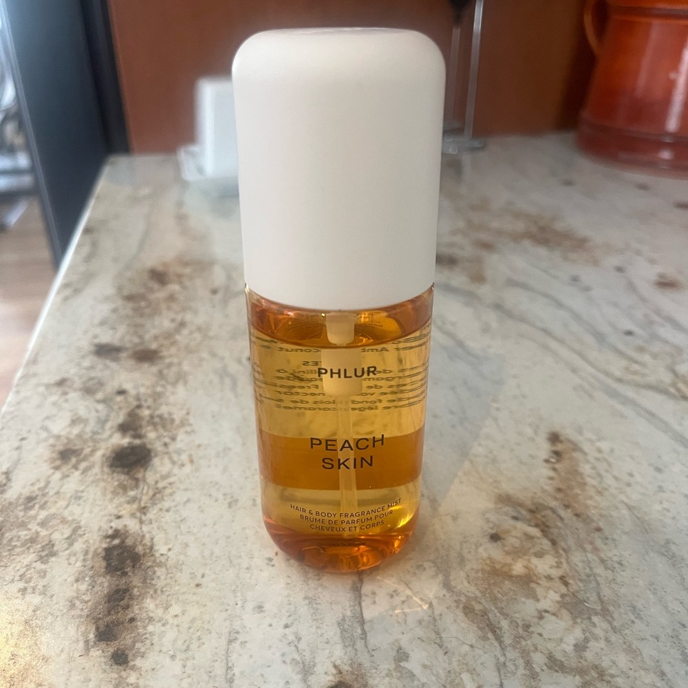 Nearly full Phlur body mist